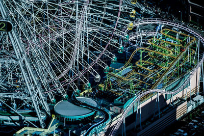 Low angle view of illuminated ferris wheel