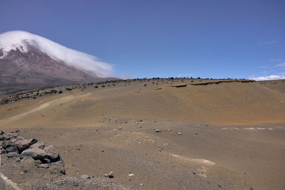 Scenic view of land against sky