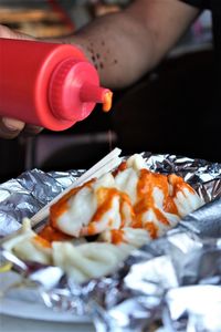 Close-up of person preparing food