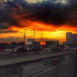 Dramatic sky over road during sunset