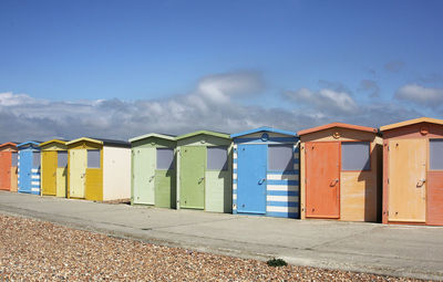 Beach huts against sky