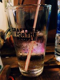 Close-up of beer glass on table