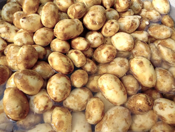 Full frame shot of onions for sale at market stall