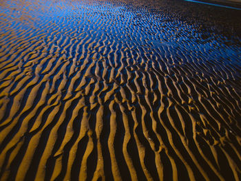 High angle view of wet sea shore