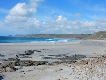 Scenic view of beach against sky