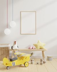 Toys on floor against wall