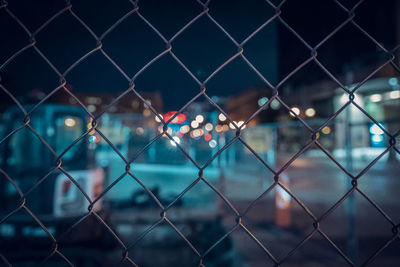 Full frame shot of chainlink fence in city