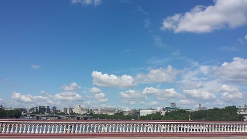 View of bridge in city against sky