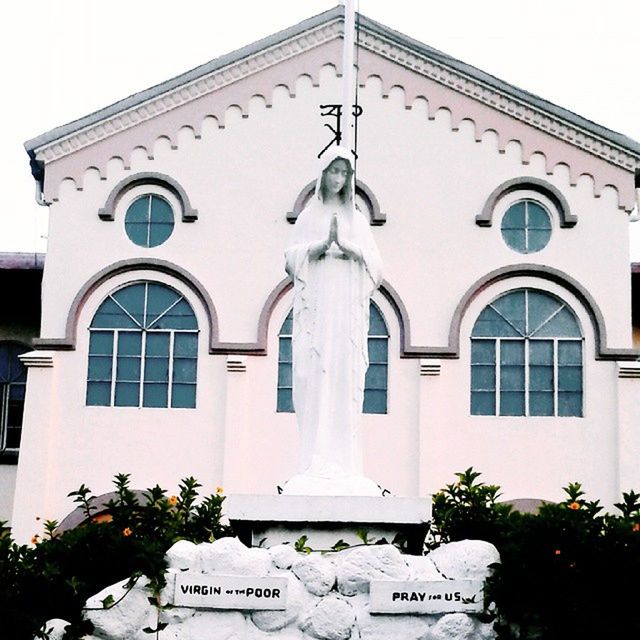 building exterior, architecture, built structure, window, facade, low angle view, arch, religion, church, spirituality, place of worship, day, outdoors, no people, door, building, entrance, sky