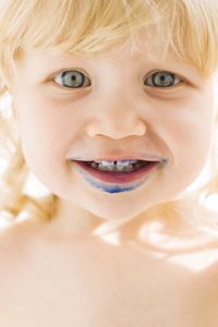 Close-up portrait of smiling boy