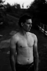 Young man looking away outdoors