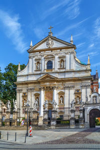 Facade of historic building against sky