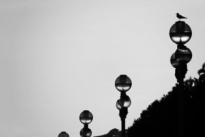 Low angle view of street light against clear sky