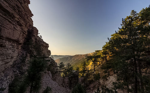 Scenic view of rocky mountains against clear sky