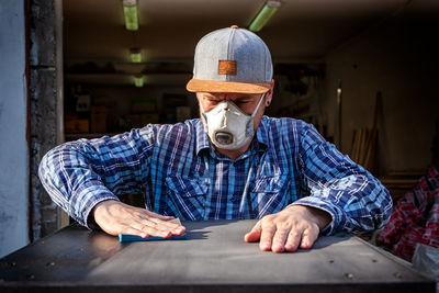 Carpenter working at workshop