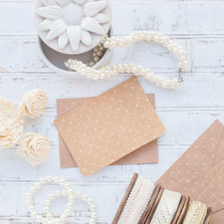High angle view of white roses in box on table