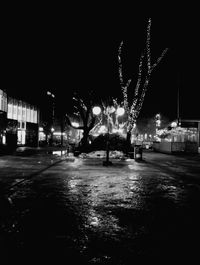 Illuminated street light at night