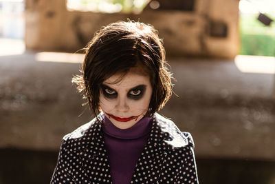 Portrait of woman standing outdoors