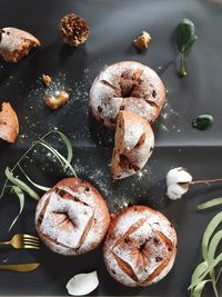 Close-up of bread with powdered sugar on table