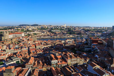 High angle shot of townscape against clear sky