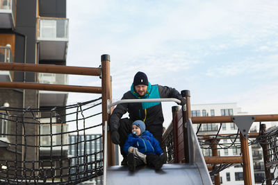 Father with son on slide