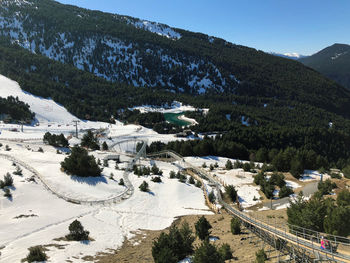 High angle view of trees and mountains against sky