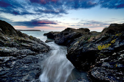 Scenic view of sea at sunset