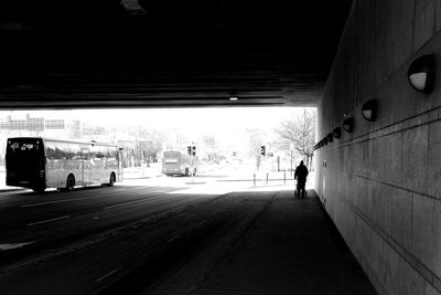 Woman walking on road