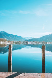 Picturesque fishing village on the coast of the lake tegernsee. pier in alpine mountains, germany