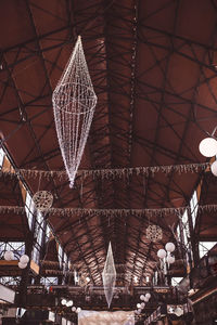 Low angle view of illuminated ceiling in building