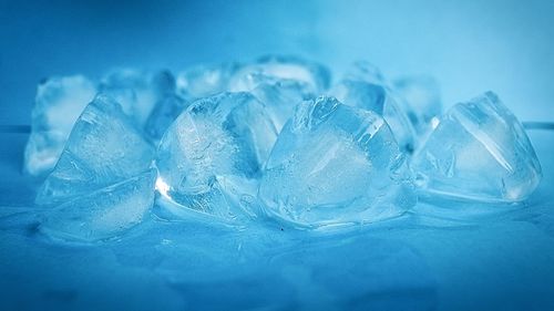 Close-up of ice crystals against blue background