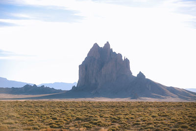 Panoramic view of rocky mountains against sky