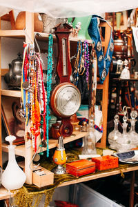 Clothes hanging in store for sale at market stall