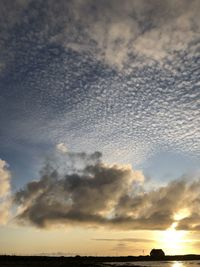 Low angle view of cloudy sky during sunset