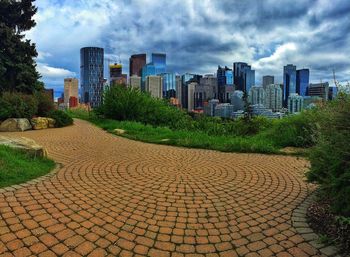 View of city buildings against sky