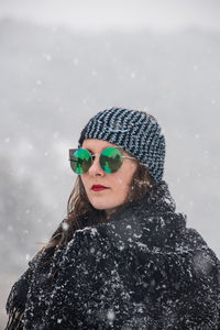 Portrait of woman wearing hat