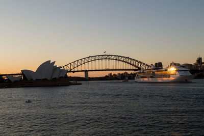 View of bridge over river against clear sky