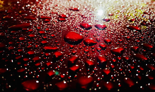 Full frame shot of raindrops on glass