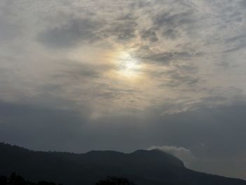 Low angle view of silhouette mountain against sky during sunset