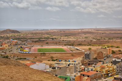 High angle view of a desert townscape against sky