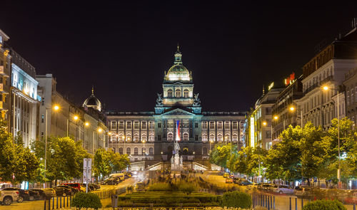 Illuminated buildings in city at night