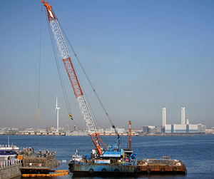 Offshore cranes at work sites in japanese ports