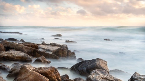 Scenic view of sea against sky during sunset