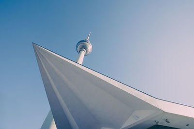 Low angle view of tower against clear blue sky