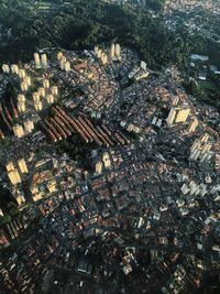 High angle view of illuminated buildings in city