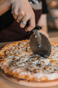 Close-up of man preparing food