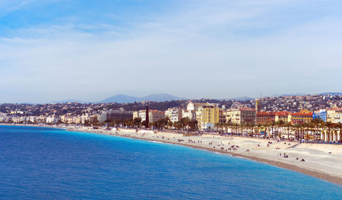 View of swimming pool at beach against sky