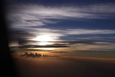 Scenic view of dramatic sky during sunset