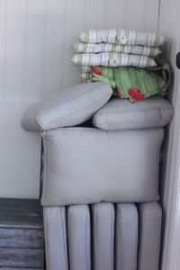 Cushions arranged by wall at home