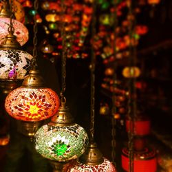 Close-up of multi colored lantern hanging at home